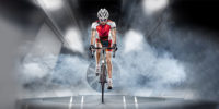 Road biker in a wind tunnel with fog