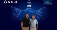 the managing directors of S.E.A. Datentechnik and ZOX in front of a blue background with handshake