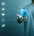 Artistic illustration of competence: Man holding globe in hand