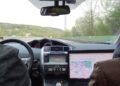 View into the car cockpit during a drive test for mobile radio measurement